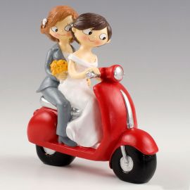 Figuur van bruid en bruidegom op motorfiets